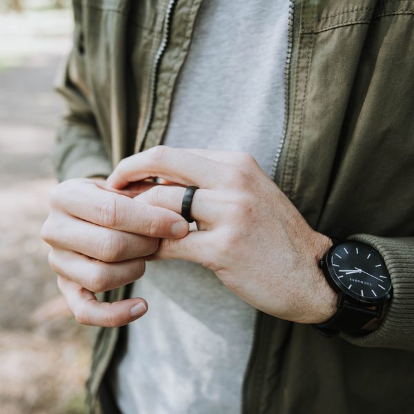 Man wearing black wedding ring